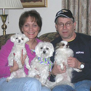 Cassidy with Mom Nancy, Dad Tom, Trinket & Muffin